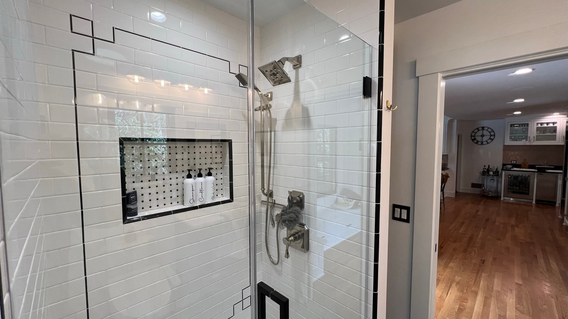 Master shower with white subway tile and black trim — South Pasadena